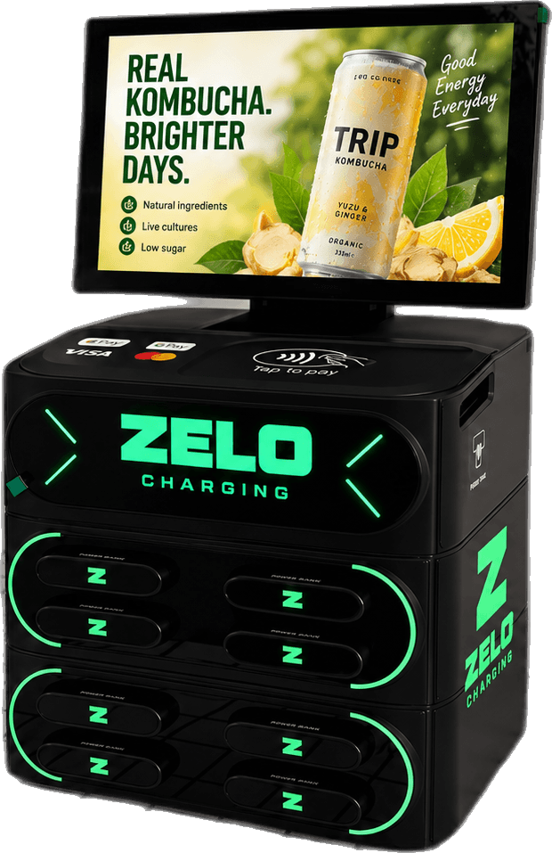 A ZELO machine seen at an angle, its screen playing a full-screen drinks ad